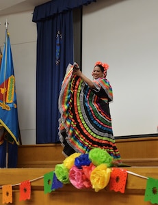 A dancer from Danzantes de San Antonio demonstrates heritage through dance at the Fiesta Showcase at the Defense Language Institute English Language Center in San Antonio, Texas, April 15, 2026. DLIELC is known as the “Gateway to America.” DLIELC builds security cooperation through English language training and cultural immersion for international military partners and pre-basic combat trainees in the U.S. Army and Coast Guard. (U.S. Air Force photo by Agnes Koterba)