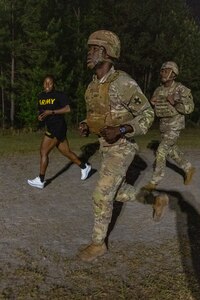 Sgt. Boris Ilboudo, 125th Finance Battalion early entry team certifier, left, and 2nd Lt. Aquoi Alexander, 125th FIBN Bravo Company platoon leader, take part in an expert physical fitness assessment, or EPFA, at Fort Jackson, S.C., April 21, 2026. Twelve finance and comptroller Soldiers took part in the EPFA, a combat-focused physical assessment, as part of the U.S. Army Finance Corps’ annual Finance Soldier of the Year competition. (U.S. Army photo by Mark R. W. Orders-Woempner)