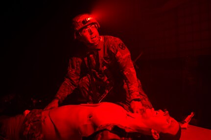 Spc. Erick Bedoya, 15th Finance Battalion financial management technician, provides tactical combat casualty care to a simulated casualty at the Medical Simulation Training Facility on Fort Jackson, S.C., April 21, 2026. Twelve finance and comptroller Soldiers were graded on their ability to provide medical care under fire as part of the U.S. Army Finance Corps’ annual Finance Soldier of the Year competition. (U.S. Army photo by Mark R. W. Orders-Woempner)