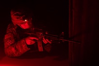 Staff Sgt. Brandon Comninos, 18th Finance Battalion financial management analyst, advances toward a simulated casualty at the Medical Simulation Training Facility on Fort Jackson, S.C., April 21, 2026. Twelve finance and comptroller Soldiers were graded on their ability to provide medical care under fire as part of the U.S. Army Finance Corps’ annual Finance Soldier of the Year competition. (U.S. Army photo by Mark R. W. Orders-Woempner)