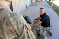 Staff Sgt. Stephen Dechant, Medical Simulation Training Facility instructor, provides instructions to a finance and comptroller Soldier at Fort Jackson, S.C., April 21, 2026. Twelve finance and comptroller Soldiers were graded on their ability to provide medical care under fire as part of the U.S. Army Finance Corps’ annual Finance Soldier of the Year competition. (U.S. Army photo by Mark R. W. Orders-Woempner)