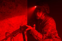 Sgt. Tina Martinez, 106th Finance Battalion Alpha Company training noncommissioned officer in charge, advances toward a simulated casualty at the Medical Simulation Training Facility on Fort Jackson, S.C., April 21, 2026. Twelve finance and comptroller Soldiers were graded on their ability to provide medical care under fire as part of the U.S. Army Finance Corps’ annual Finance Soldier of the Year competition. (U.S. Army photo by Mark R. W. Orders-Woempner)