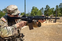 Staff Sgt. Brandon Comninos, 18th Finance Battalion financial management analyst, fires an M4 carbine at Fort Jackson, S.C., April 22, 2026. Twelve finance and comptroller Soldiers took their best shots as part of the U.S. Army Finance Corps’ annual Finance Soldier of the Year competition. (U.S. Army photo by Mark R. W. Orders-Woempner)