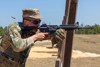 Cpl. Hunter Pressley, 15th Finance Battalion financial management technician, fires an M4 carbine at Fort Jackson, S.C., April 22, 2026. Twelve finance and comptroller Soldiers took their best shots as part of the U.S. Army Finance Corps’ annual Finance Soldier of the Year competition. (U.S. Army photo by Mark R. W. Orders-Woempner)