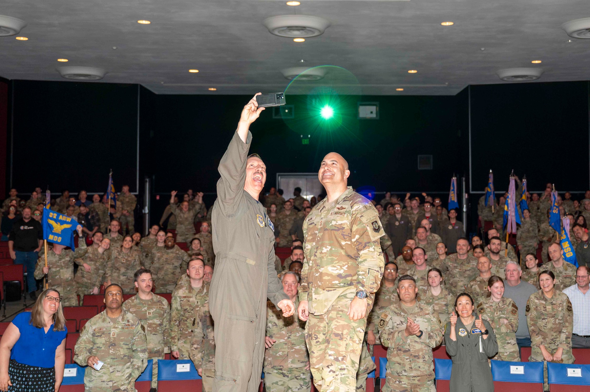Airmen pose for a photo.