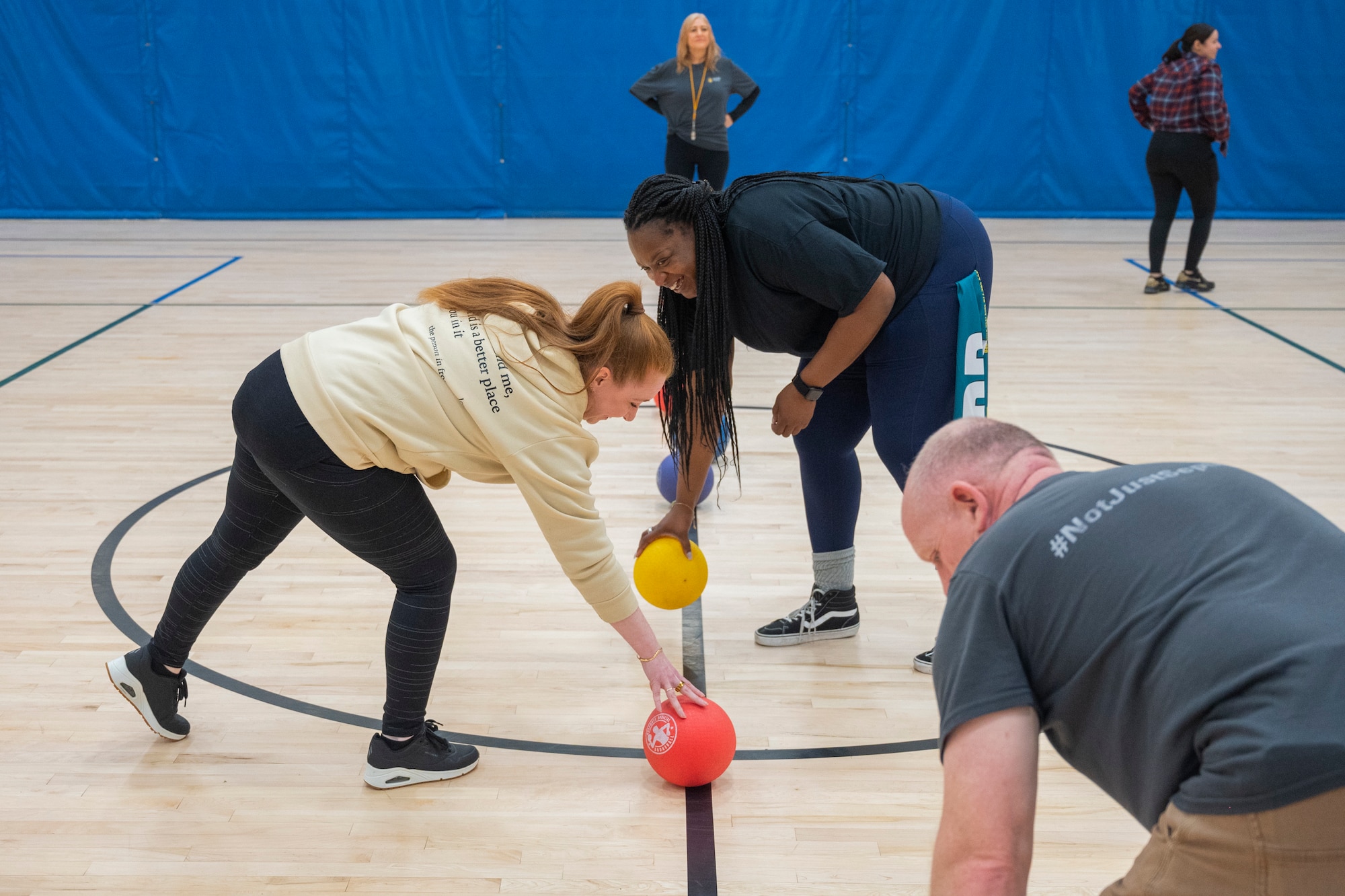 62d Airlift Wing Integrated Prevention and Resilience Office and Joint Base Lewis-McChord Army Substance Abuse Program team members set up for another match during the Directorate of Human Resources-ASAP National Alcohol Awareness Month dodgeball tournament at JBLM, Washington, April 2, 2026.