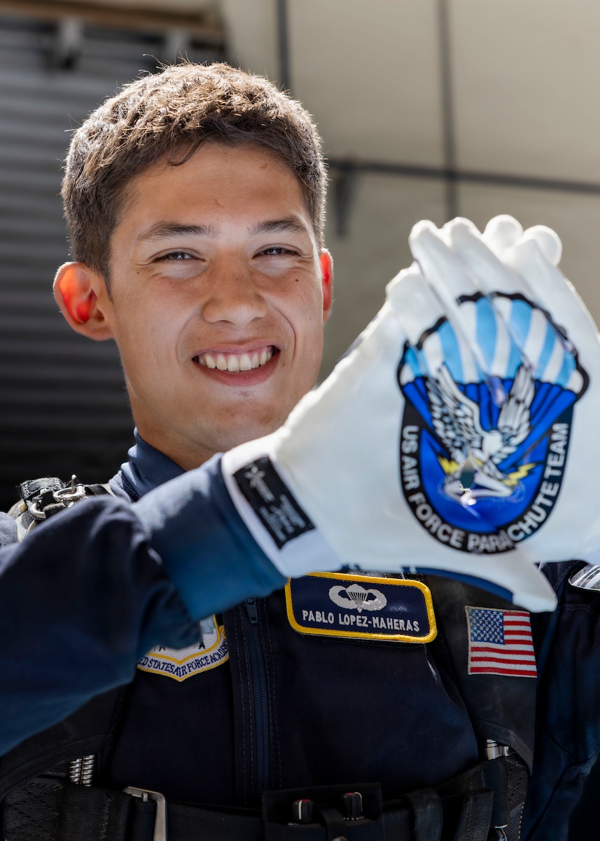 Pablo Lopez-Maheras, a U.S. Air Force Academy cadet and Wings of Blue member, prepares for a demonstration during the Peru Airshow at Las Palmas Air Base, Peru, April 26, 2026. Lopez-Maheras, a first-generation American with family ties to Lima, Peru, grew up visiting the country and maintains close connections with relatives there. His participation represents his commitment to training and continued development in military service and aviation. (U.S. Air Force photo by Staff Sgt. Lauren Diaz)