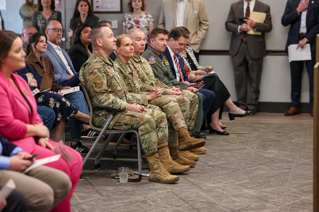 Leadership from Sheppard Air Force Base and community members listen to remarks during the ribbon‑cutting ceremony for the Midwestern State University Military Education Center in Wichita Falls, Texas, April 29, 2026.