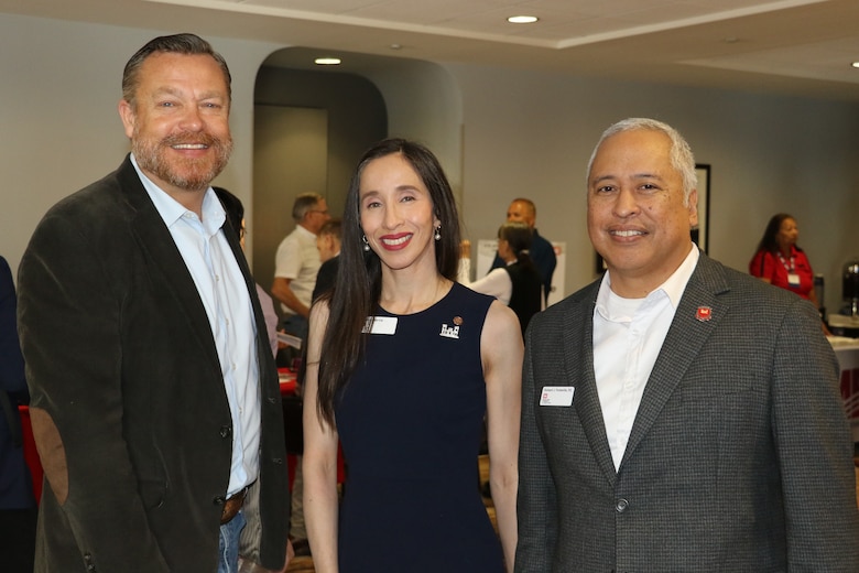 U.S. Army Corps of Engineers Los Angeles District’s Justin Gay, construction management branch chief; Claudia Garcia, a program manager, and Richard Fontanilla, an area engineer, pose for a photo after greeting participants at the Business Opportunities Open House March 18 at the Midtown Hilton Garden Inn in Phoenix.