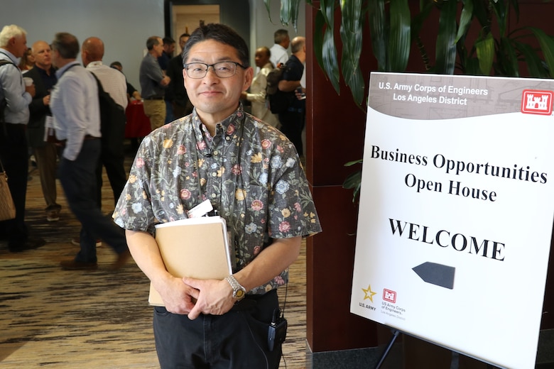 Kinya “Roger” Minami, a procurement analyst with the U.S. Army Corps of Engineers Los Angeles District, poses for a photo following his opening address to at the Business Opportunities Open House March 18 at the Midtown Hilton Garden Inn in Phoenix. Small businesses represented more than 90 percent of the participants.