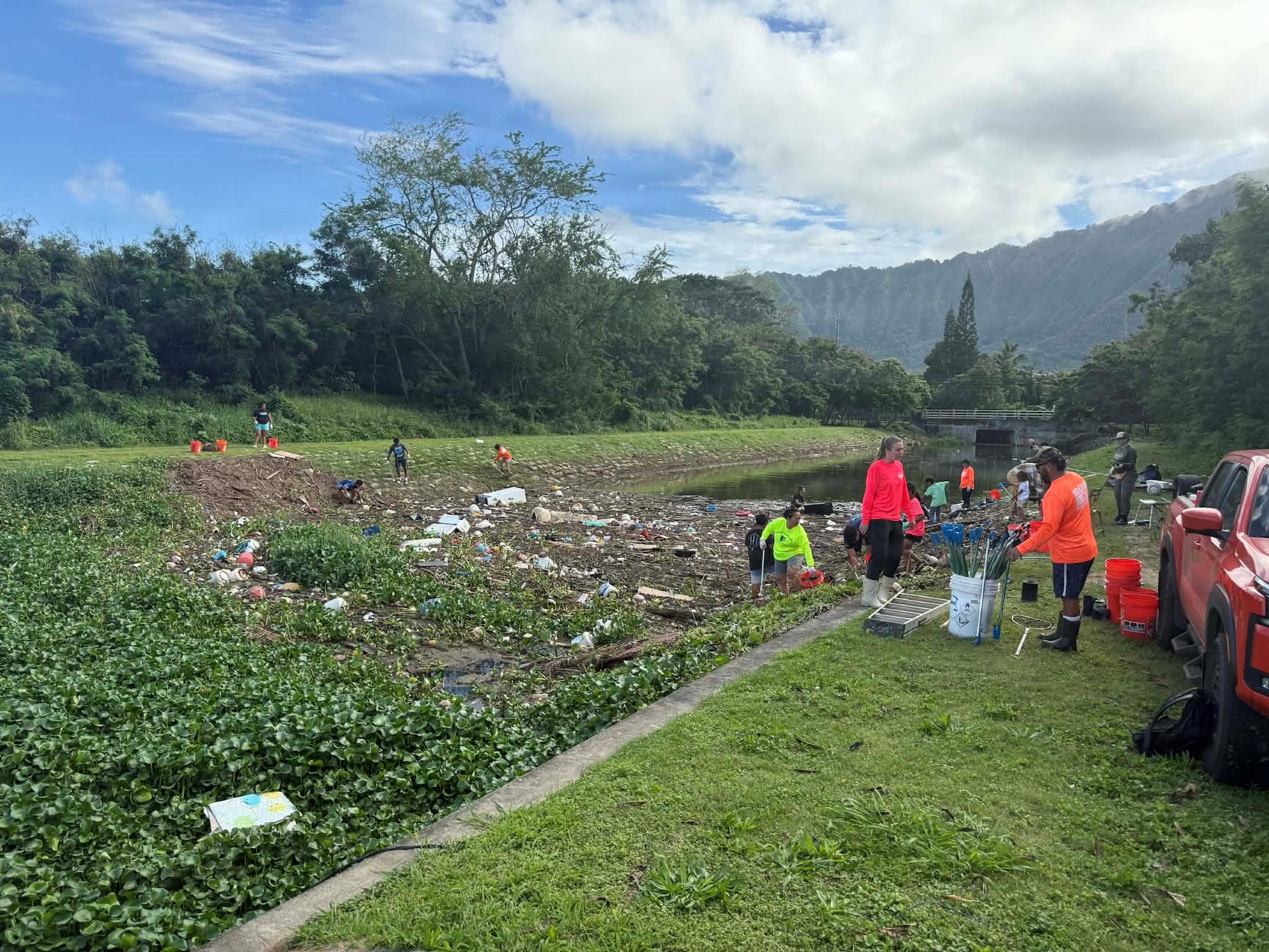 Volunteers clear waterways on Bellows Air Force Station.