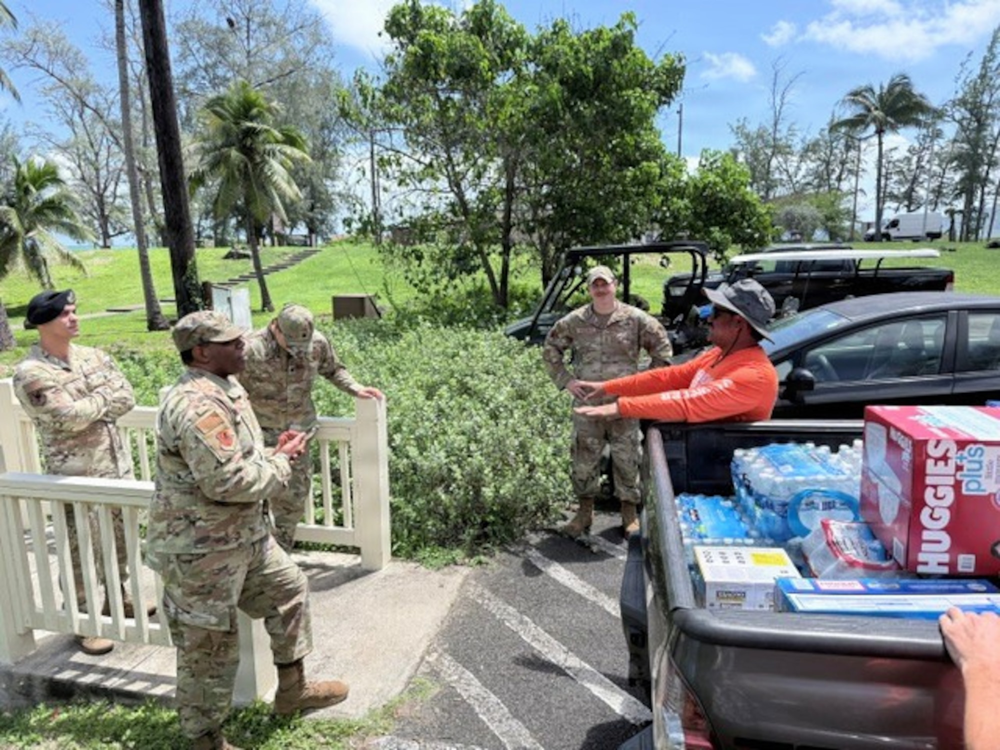 U.S. Air Force Airmen compile supplies for those affected in the kona storm's flooding.