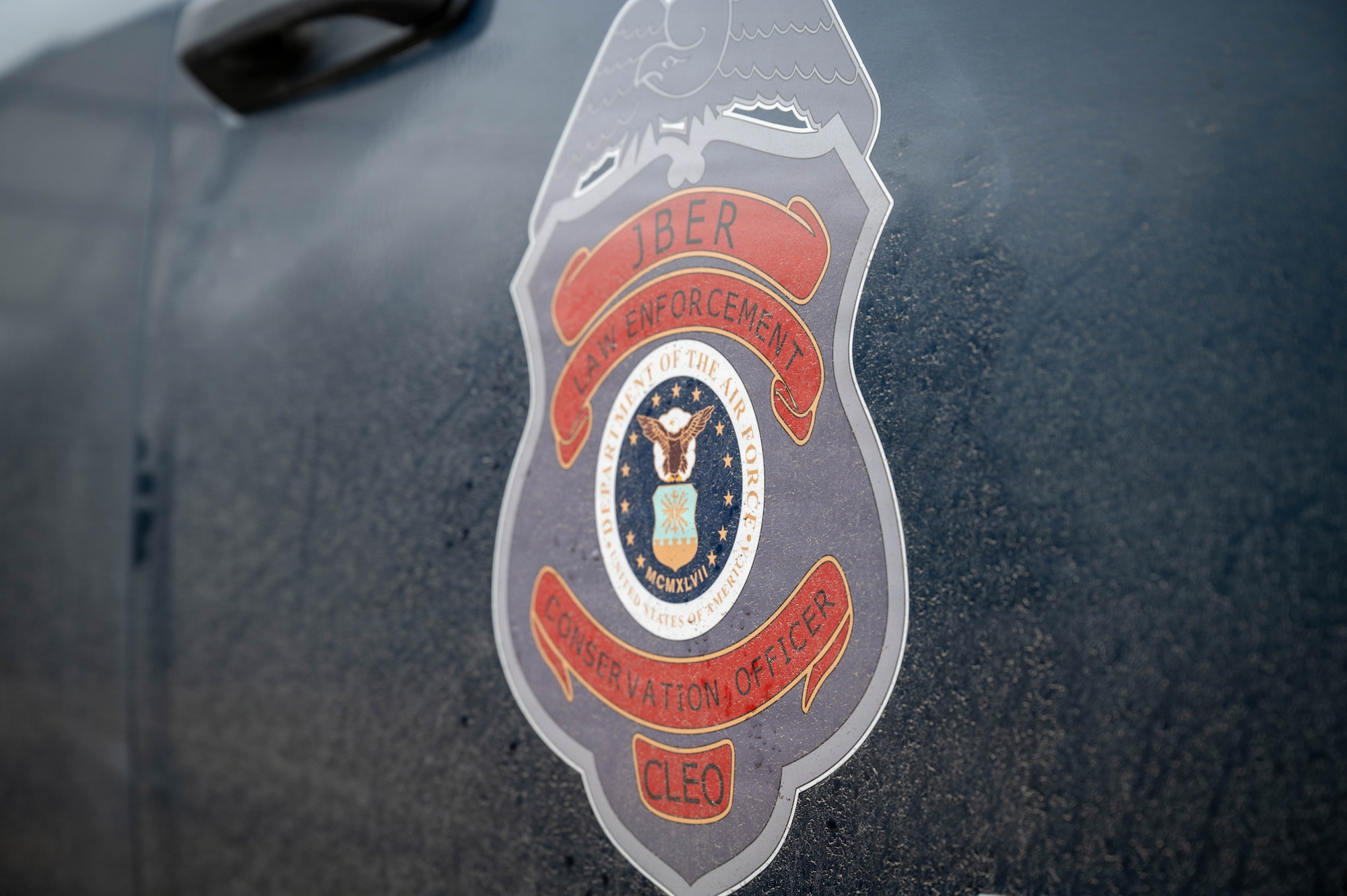 A Joint Base Elmendorf-Richardson Conservation Law Enforcement vehicle displays the organization's emblem at JBER, Alaska, April 27, 2026.
