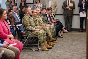 Leadership from Sheppard Air Force Base and community members listen to remarks during the ribbon‑cutting ceremony for the Midwestern State University Military Education Center in Wichita Falls, Texas, April 29, 2026.