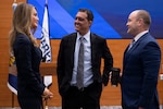 Kelly Loeffler, administrator of the Small Business Administration; Emil Michael, undersecretary of war for research and engineering; and Stephen Winchell, director of the Defense Advanced Research Projects Agency, speak following an event at DARPA headquarters in Arlington, Va., April 29, 2026.