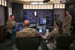 Members of the National Guard Bureau Public Affairs Office conduct livestream operations during the virtual NGB-PA Public Affairs Training Workshop, in Arlington, Va., April 22, 2026. The Public Affairs Training Workshop is an annual event that brings the Guard enterprise together and ensures that Public Affairs professionals have a platform to share best practices and get the most up to date information such as pending changes to the field. Photo by Sgt. 1st Class Amber Peck.