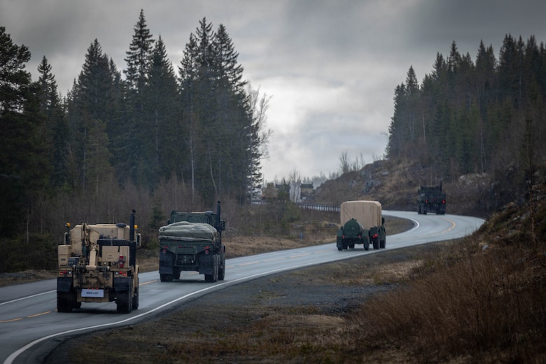 U.S. Marines and Sailors with Combat Logistics Battalion 24, Combat Logistics Regiment 27, 2nd Marine Logistics Group, conducts a long-range convoy during exercise Aurora 26 in Norway, April 25, 2026. The long-range convoy from Værnes, Norway to Sundsvall, Sweden showcased CLB-24's unit readiness and interoperability with NATO Allies and partners. U.S. Marines and Sailors with 2nd MLG are participating in exercise Aurora as part of the larger U.S. Army-led Sword 26 series of linked multinational exercises, which directly supports NATO's Eastern Flank Deterrence Initiative concept, validates defense plans, builds a unified lethal force, and strengthens deterrence. (U.S. Marine Corps photo by Lance Cpl. Brady Hathaway)