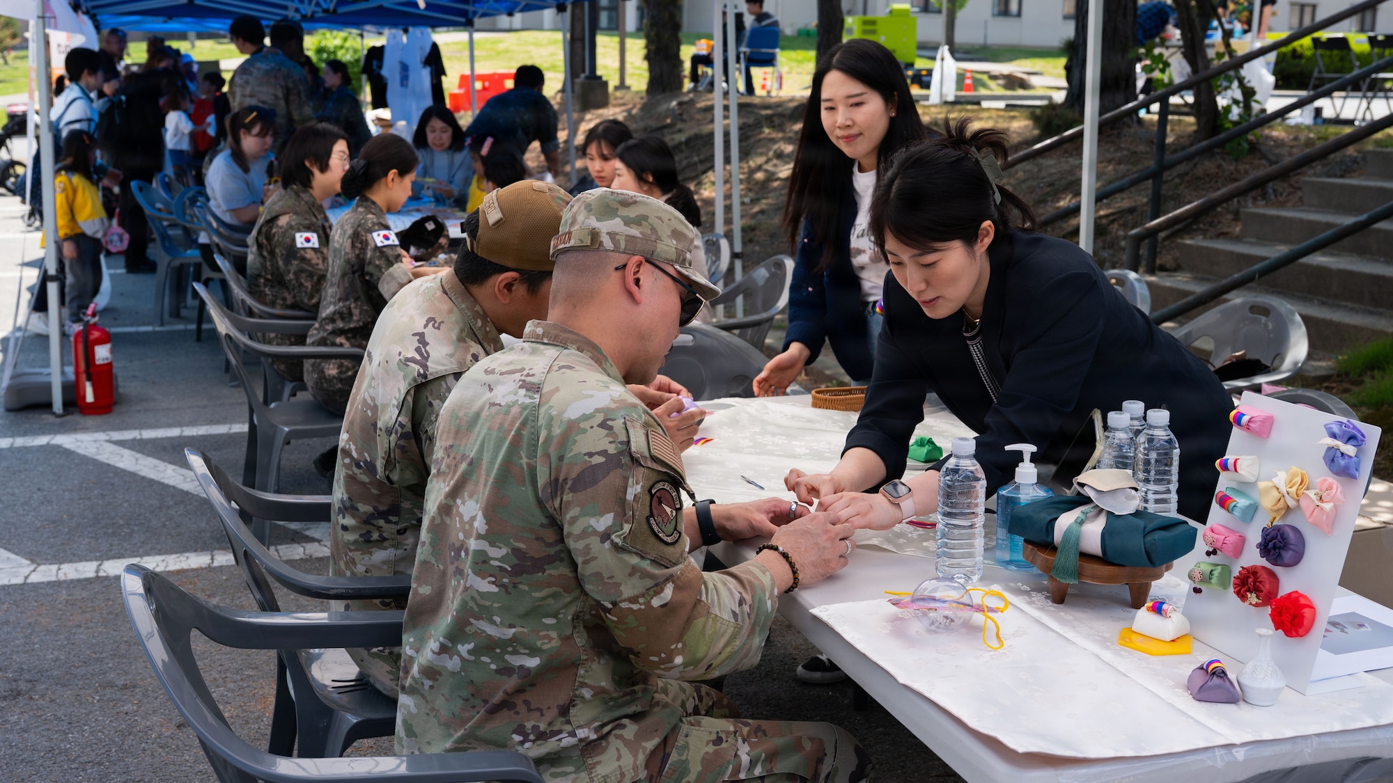 U.S. Airmen assigned to the 51st Fighter Wing participate in the K-Culture Day event at Osan Air Base, Republic of Korea, April 30, 2026. K-Culture Day highlighted the strength of the U.S.–ROK alliance by fostering cultural exchange and mutual understanding across the Osan community. (U.S. Air Force photo by Senior Airman Rome Bowermaster)