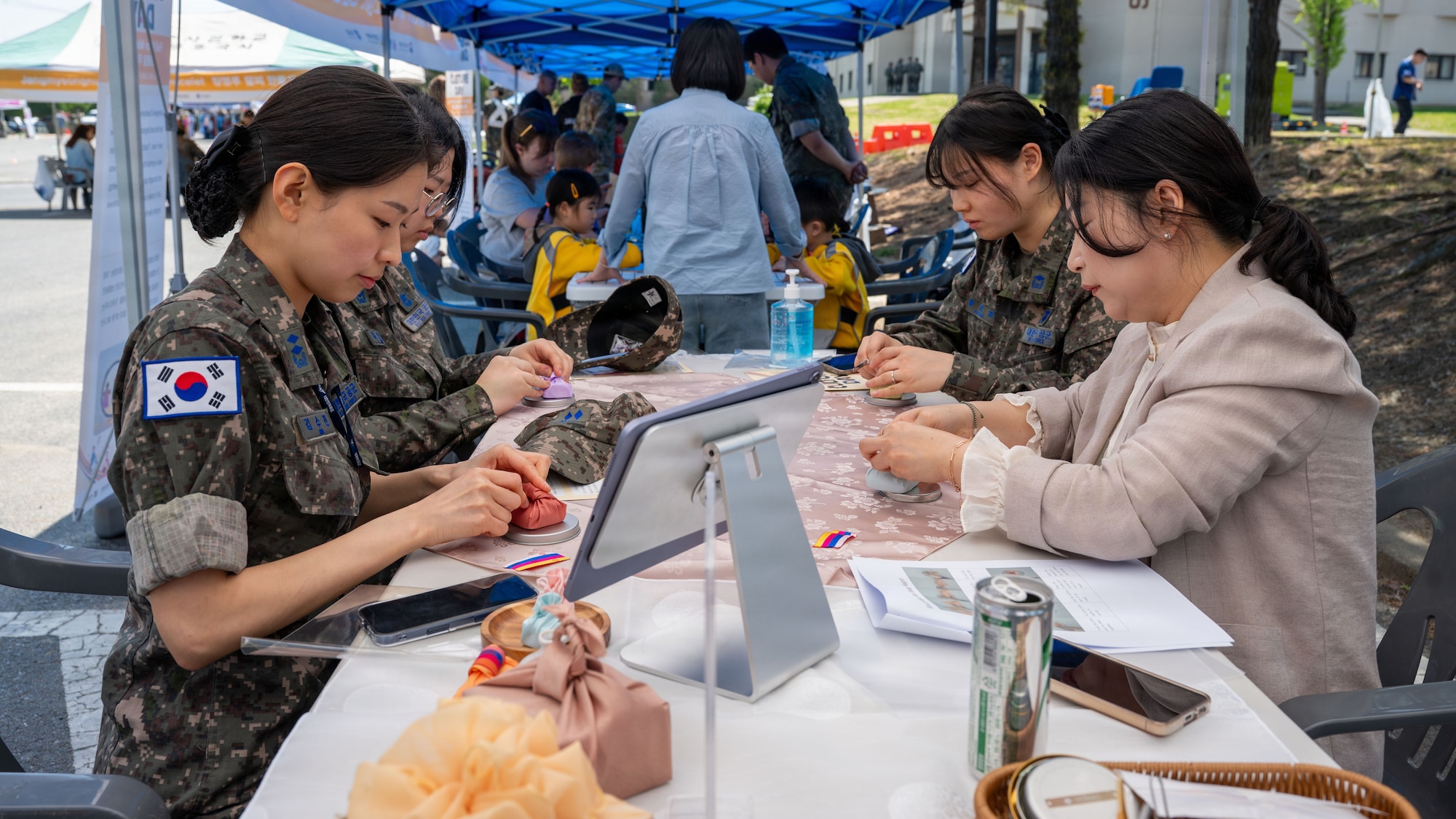 Republic of Korea airmen participate in the K-Culture Day event at Osan Air Base, ROK, April 30, 2026. The event brought the Osan community together to build relationships beyond the mission through shared cultural experiences. (U.S. Air Force photo by Senior Airman Rome Bowermaster)