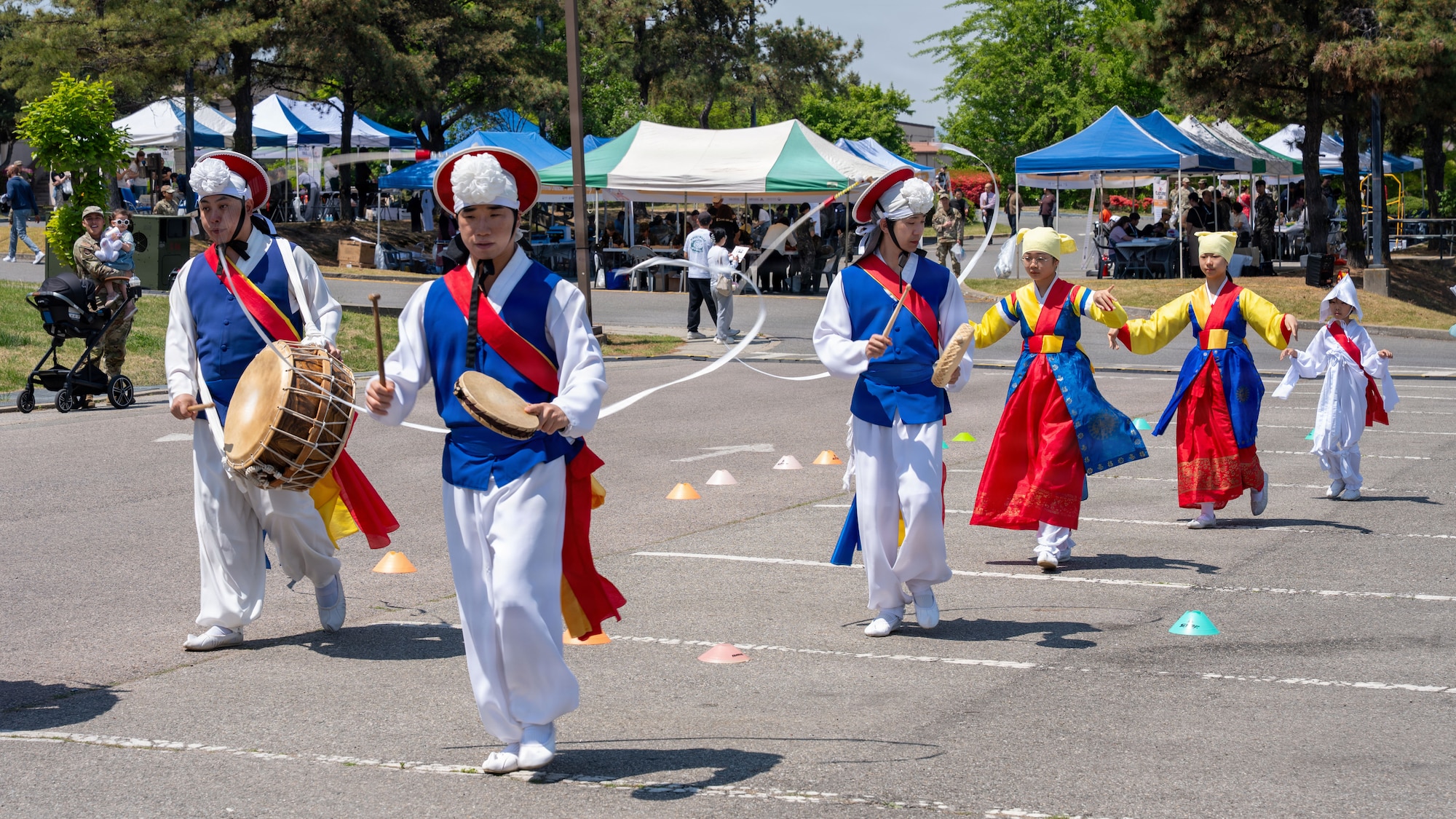 Members from the local community perform a traditional Korean dance during the K-Culture Day event at Osan Air Base, Republic of Korea, April 30, 2026. K-Culture Day highlighted the strength of the U.S.–ROK alliance by fostering cultural exchange and mutual understanding across the Osan community. (U.S. Air Force photo by Senior Airman Rome Bowermaster)