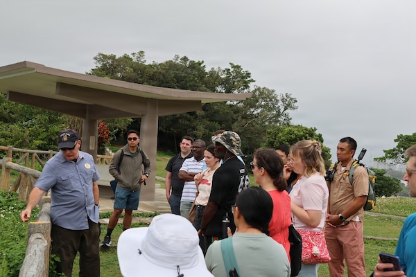 260409-N-TW242-1002 OKINAWA, Japan (April 9, 2026) - U.S. Naval Hospital Okinawa Wardroom
Observes the Start of the Battle of Okinawa on April 9th, 2026. MCCS tour guide Chris Majewski talks to the group of Sailors from USNHO about the battle at Hacksaw Ridge. (U.S. Navy photo by Public Affairs Officer Trey Savitz)