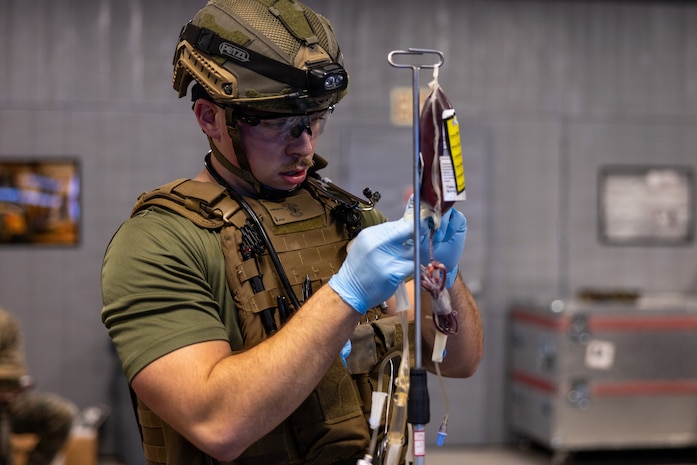 U.S. Navy Hospital Corpsman 2nd Class Kenneth Murray III, a Joint Trauma System Valkyrie Prehospital Transfusion course instructor candidate with 2nd Medical Battalion, 2nd Marine Logistics Group, conducts a blood transfusion during the first JTS-VPT course at Marine Corps Base Camp Lejeune. 2nd MLG is the first Marine Corps unit certified by the Joint Trauma System as a training site for the JTS-VPT course, which can now be held by 2nd Medical Battalion's Alpha Surgical Company on MCB Camp Lejeune and Bravo Surgical Company in Portsmouth, Virginia. The course focused on learning and practical application of fresh whole blood collection and transfusion for patients in forward-deployed and austere environments utilizing standardized, evidence-based protocols. Murray is a native of Ohio. (U.S. Marine Corps photo by Lance Cpl. Talan Werner)