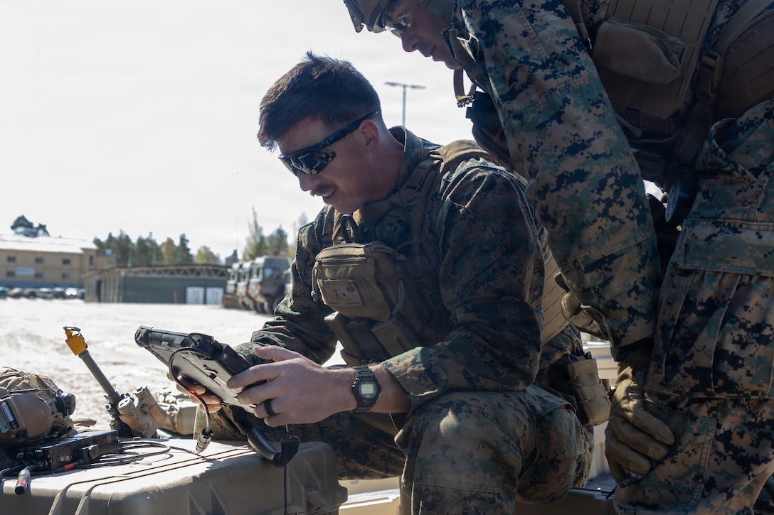 U.S. Marine Corps Sgt. Ethan Busenitz, an explosive ordnance disposal technician with Combat Logistics Battalion 24, Combat Logistics Regiment 27, 2nd Marine Logistics Group, operates an SUG-V 3-10 robot in Kvarn, Sweden, April 26, 2026. The SUG-V 3-10 robot is a small, unmanned ground vehicle that Busenitz operated during exercise Aurora 26. EOD Marines hone their skills and safety procedures for the handling and disposal of ordnance in every environment. U.S. Marines and Sailors with 2nd MLG are participating in exercise Aurora as part of the larger U.S. Army-led Sword 26 series of linked multinational exercises, which directly supports NATO's Eastern Flank Deterrence Initiative concept, validates defense plans, builds a unified lethal force, and strengthens deterrence. Busenitz is a native of Virginia. (U.S. Marine Corps photo by Lance Cpl. Talan Werner)