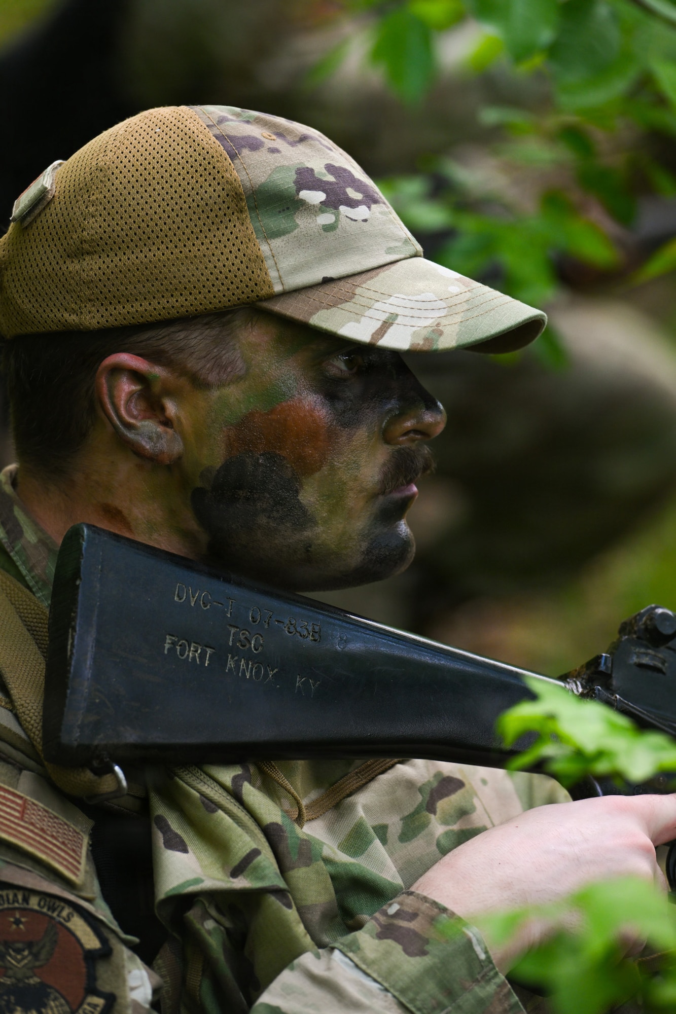 U.S. Air Force Senior Airman Cobe Chapman, Element National Geospatial Intelligence Agency geospatial intelligence analyst, defends his squadron during a training exercise at Marine Corps Base Quantico, Virginia, April 24, 2026.