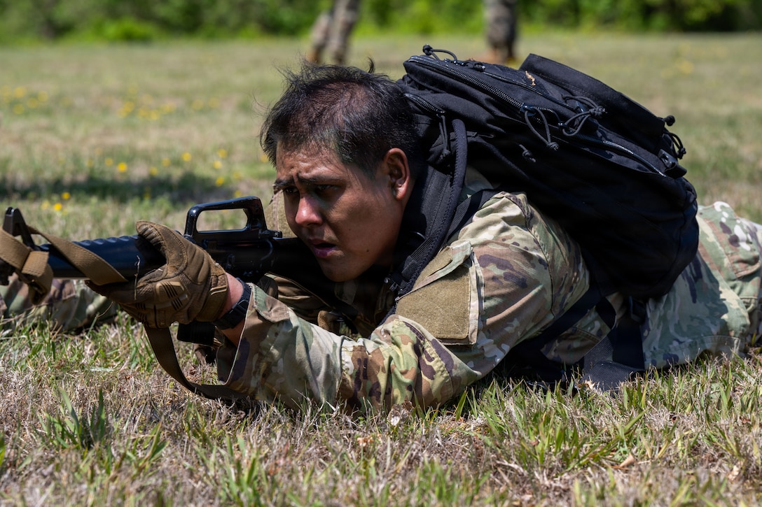 U.S. Air Force Senior Airman Axel Ayala, a 316th Security Forces Squadron patrolman, aims his weapon during a simulated drill at Marine Corps Base Quantico, Virginia, April 24, 2026.