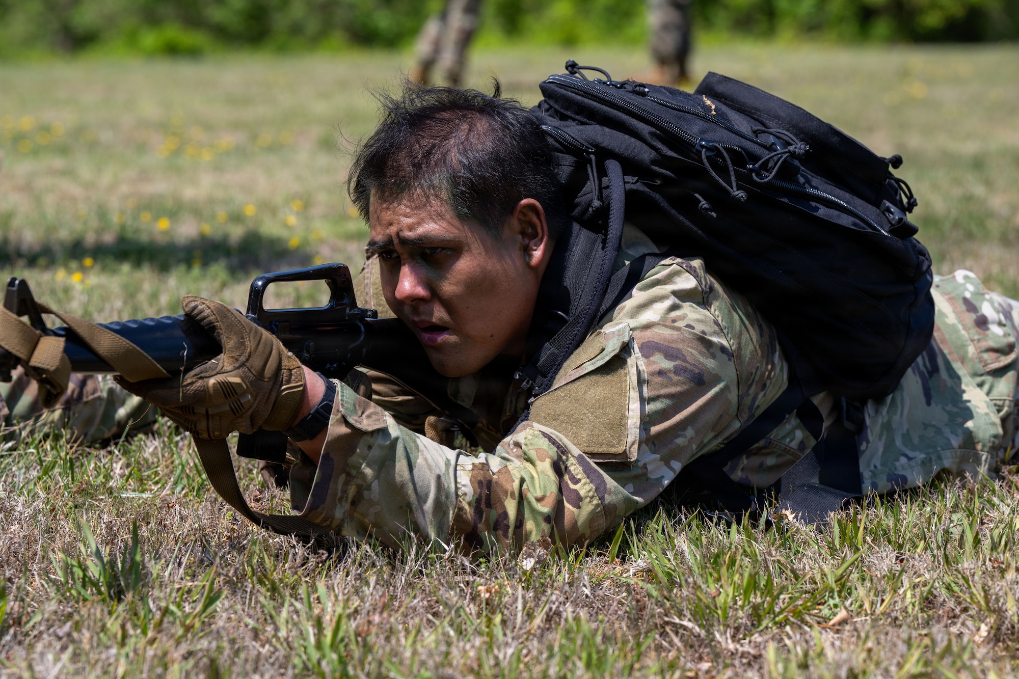 U.S. Air Force Senior Airman Axel Ayala, a 316th Security Forces Squadron patrolman, aims his weapon during a simulated drill at Marine Corps Base Quantico, Virginia, April 24, 2026.