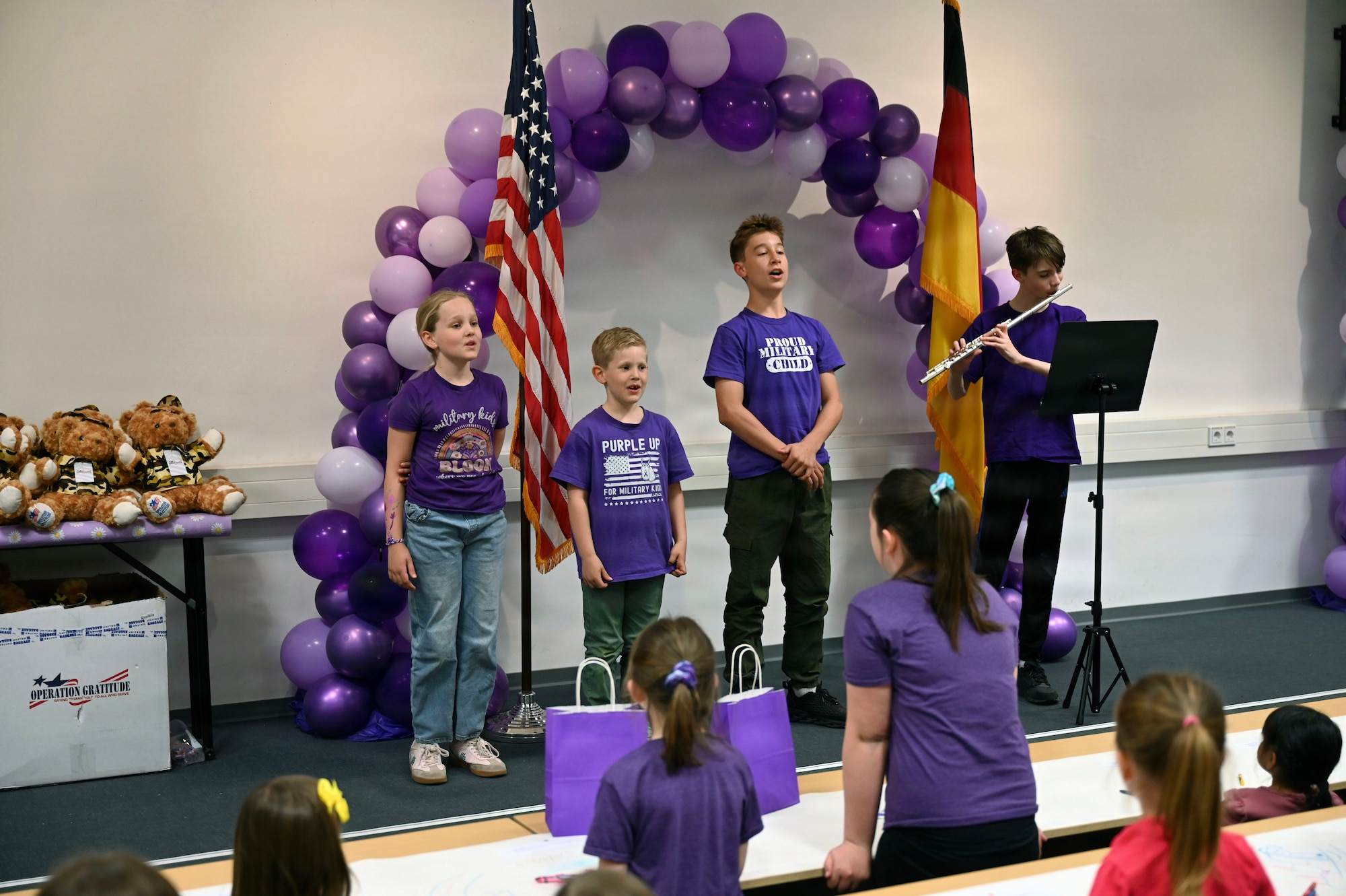 children sing the National Anthem