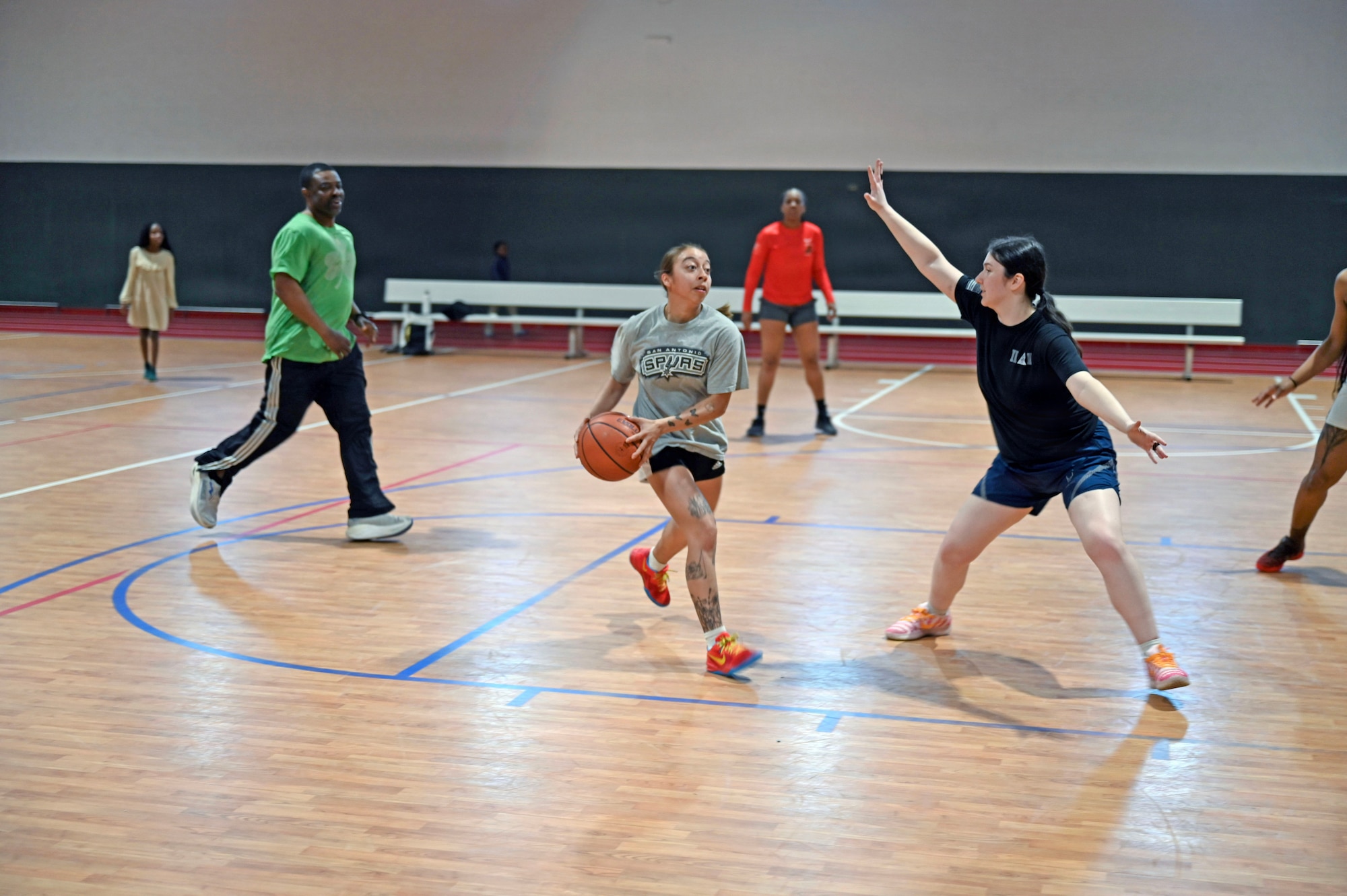 Women practice for volleyball game