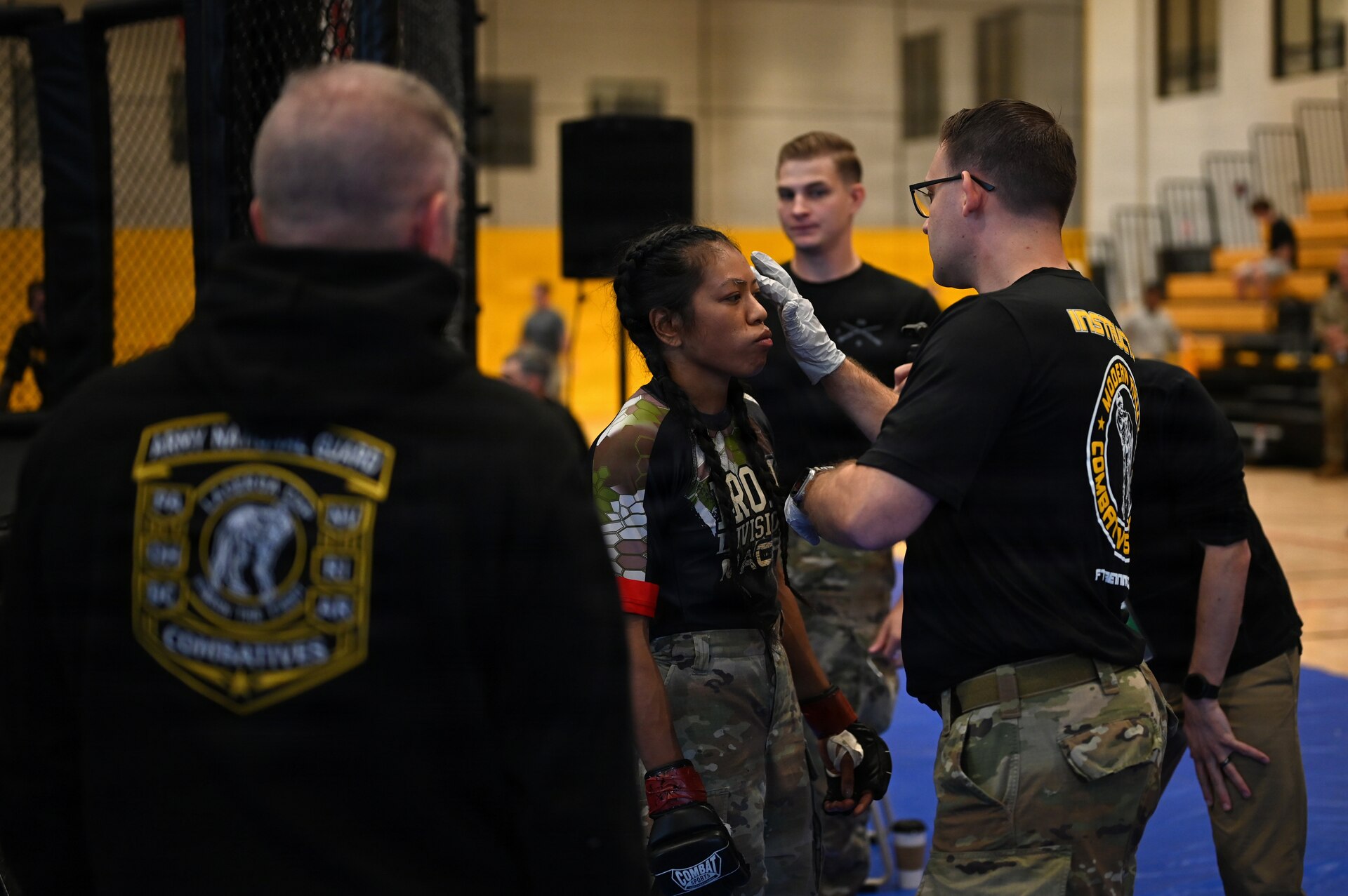 U.S. Army Spc. Sandra Chheng (center), Pennsylvania Army National Guard, competes in the heavyweight finals during day three of the 2026 Lacerda Cup All-Army Combatives Championship at Fort Benning, Ga. Apr. 10, 2026. The two Army National Guard teams finished the tournament with third and sixth place team standings out of twenty-one teams competing, with three National Guard Soldiers earning championship belts. (U.S. Army National Guard photo by Sgt. 1st Class Shane Smith)