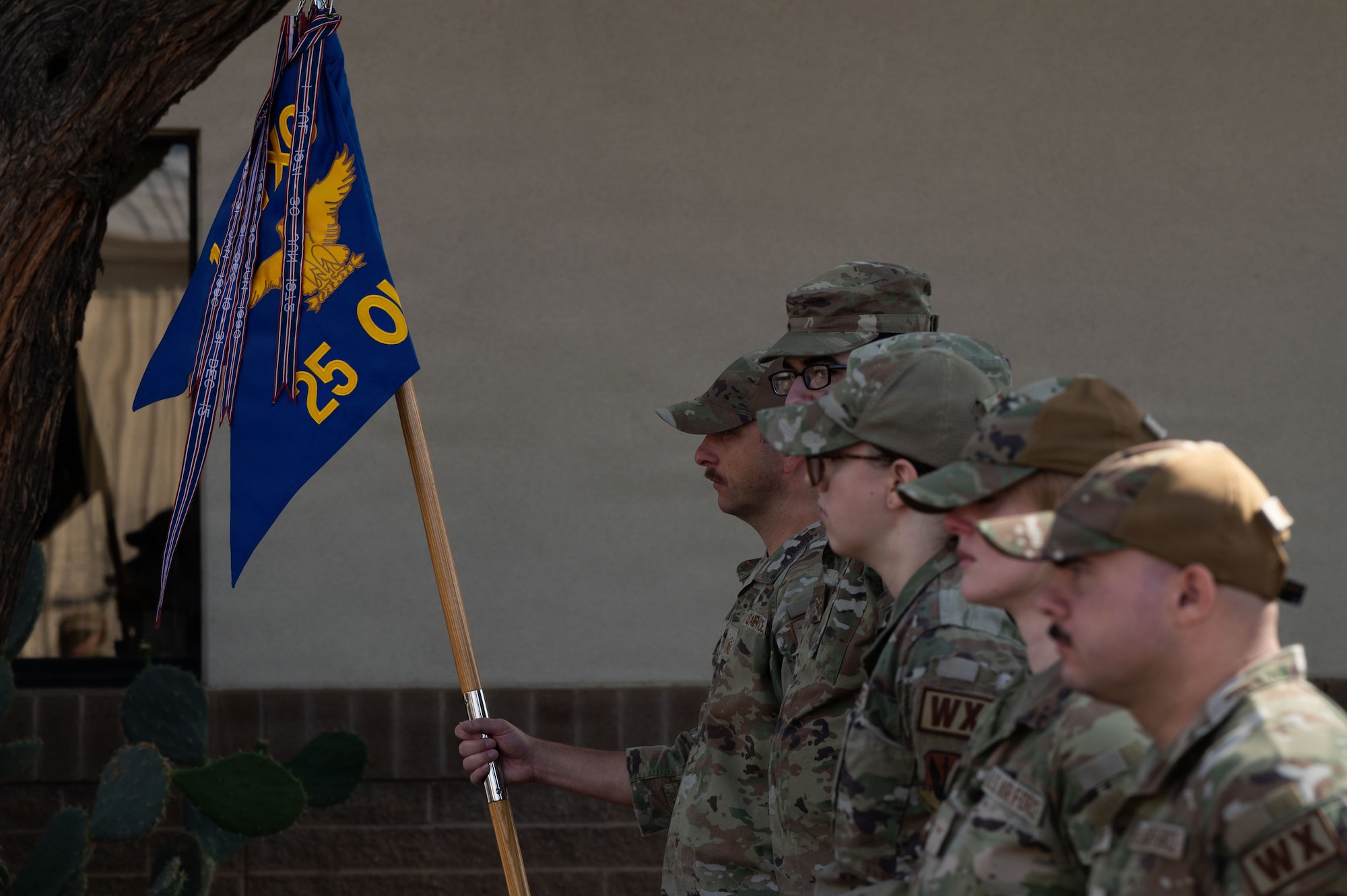 U.S. Airmen assigned to the 25th Operational Weather Squadron stand in formation during the Capt. Nathan J. Nylander Memorial Ceremony at Davis-Monthan Air Force Base, Arizona, April 24, 2026. Nylander, a weather officer with the 25th OWS, is honored annually by the squadron in recognition of his service and sacrifice. (U.S. Air Force photo by Airman Najzee Kuzu)