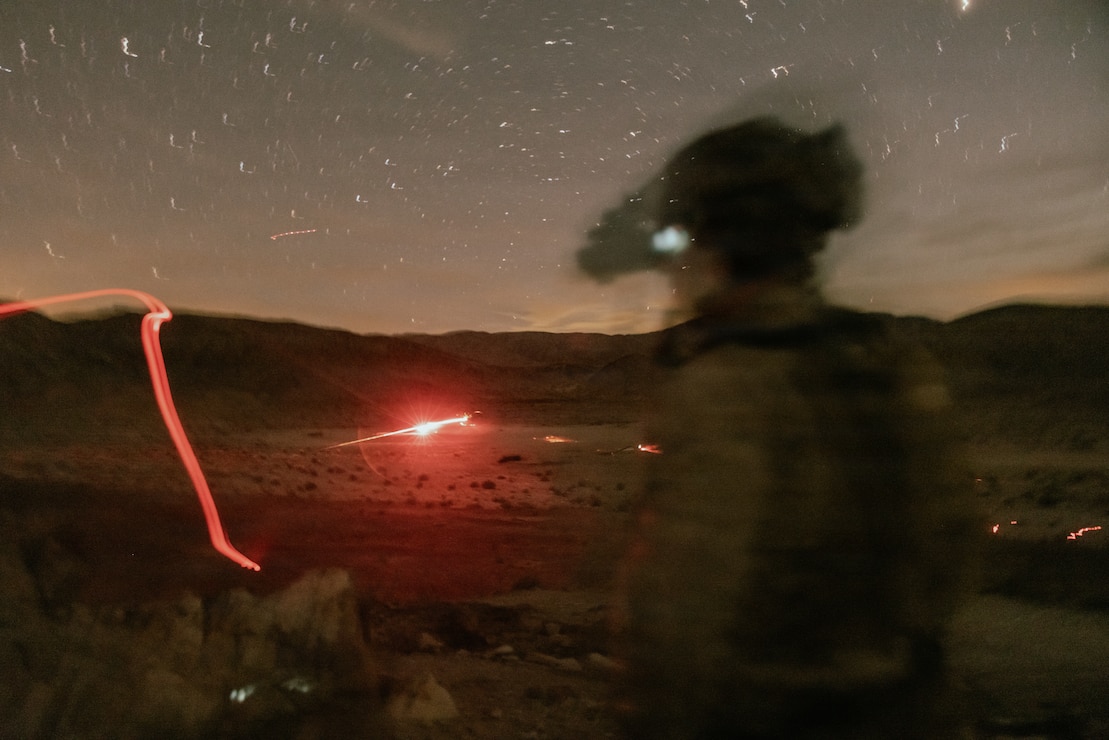 U.S. Marines with Alpha Company, 1st Battalion, 2nd Marine Regiment, 2nd Marine Division, engage stationary targets during a live fire platoon attack on range 410 Alpha as part of Service Level Training Exercise 2-26 on Marine Corps Air Ground Combat Center, Twentynine Palms, California, April 3, 2026. Designed to simulate the most realistic complex training environment available, SLTE 2-26 ensures units are combat-ready and capable of operating as an integrated Marine Air-Ground Task Force. (U.S. Marine Corps photo by Lance Cpl. Dominic Trujillo)