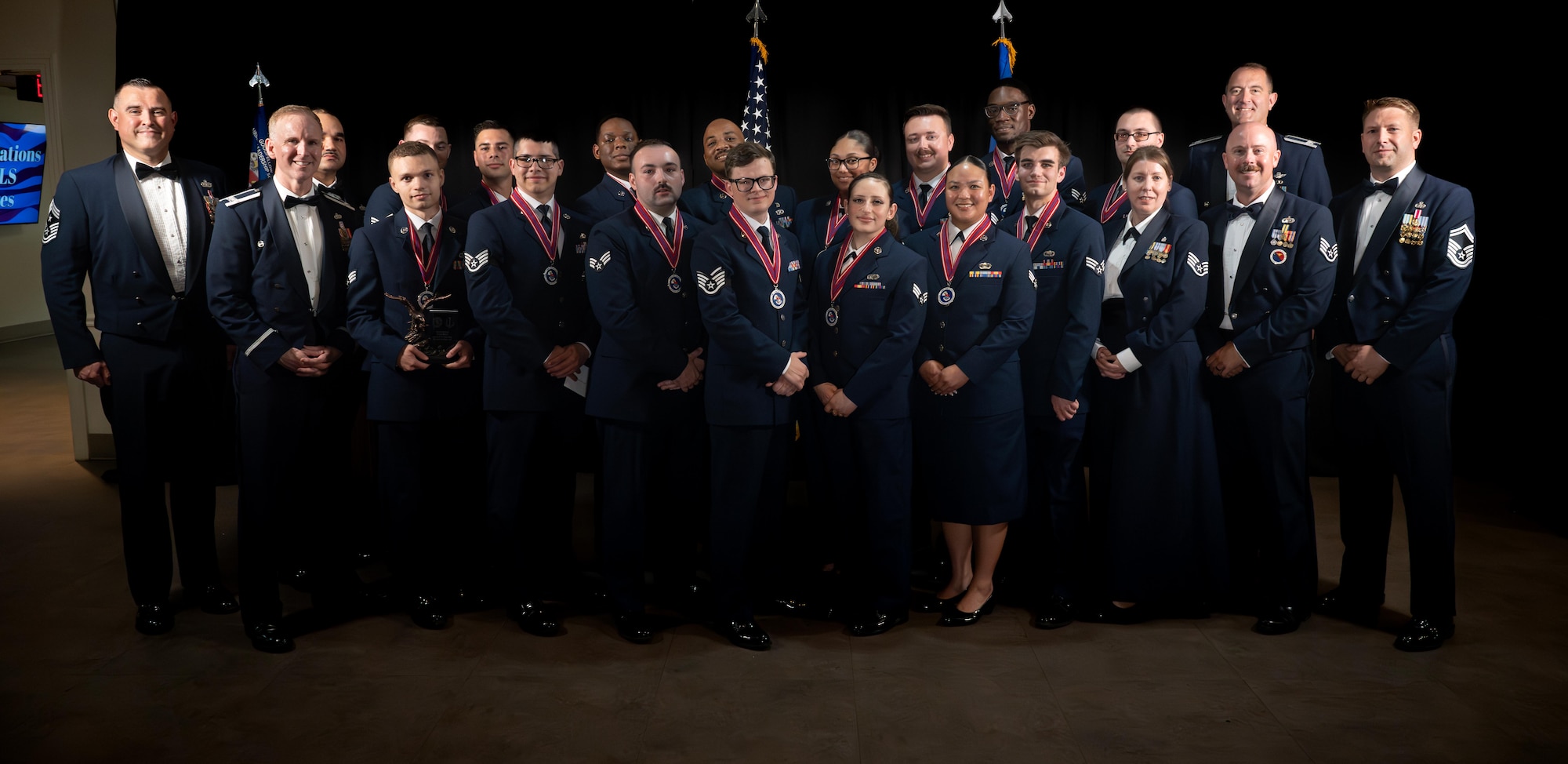 Airman Leadership School Class 26-C and leadership pose for a class photo at the ALS Class 26-C graduation at Laughlin Air Force Base, Texas, April 29, 2026. ALS is a five-week course designed to prepare senior airmen to assume supervisory duties through instruction in leadership, followership and written and oral communication skills. (U.S. Air Force photo by Airman 1st Class Harrison Sullivan)