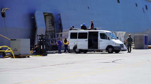 SAN DIEGO (April 11, 2026) A team from Space Tango awaits the removal of the ‘A Virtual Astronaut Tissue Analog Response’ AVATAR payload from the USS John P. Murtha (LP D26) for transportation to     Naval Health Research Center (NHRC)’s operational laboratory. NHRC, part of Navy Medicine Research & Development, supports Navy, Marine Corps and joint U.S. warfighter health readiness and lethality with research and development that delivers high-value, high-impact solutions to the health and readiness challenges U.S. military population faces on the battlefield, at-sea, home and abroad. (U.S. Navy photo by Danielle Cazarez/released)