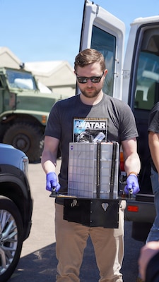 SAN DIEGO (April 11, 2026) Jason Rexroat, with Space Tango, transports a samples of bone marrow organ chips from the ‘A Virtual Astronaut Tissue Analog Response’ (AVATAR) investigation to Naval Health Research Center (NHRC)’s operational laboratory. The samples were received from the NASA Exploration Ground Systems team after the 10-day Artemis II mission around the Moon in the Orion capsule. NHRC, part of Navy Medicine Research & Development, supports Navy, Marine Corps and joint U.S. warfighter health readiness and lethality with research and development that delivers high-value, high-impact solutions to the health and readiness challenges U.S. military population faces on the battlefield, at-sea, home and abroad. (U.S. Navy photo by Danielle Cazarez/released)