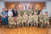 Group photo of Tobyhanna employees and cadets