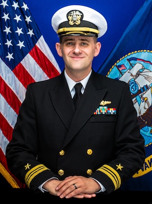Official portrait of Lt. Cmdr. Garret Walton. (U.S. Navy photo)