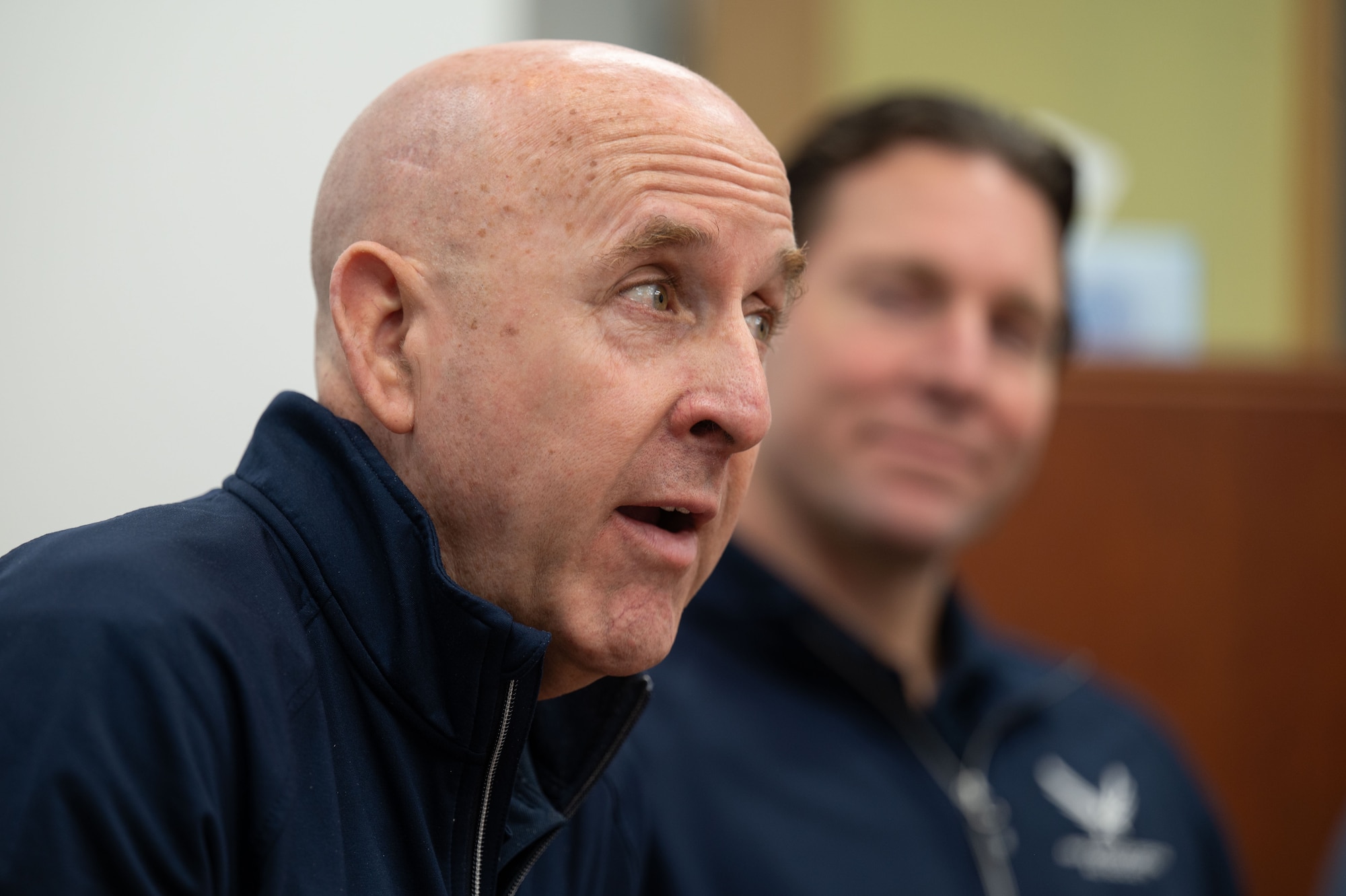 U.S. Air Force retired Maj. Gen. Ed Thomas, Air and Space Forces Aid Society chief executive officer, left, and Packy Lyden, AFAS chief development officer, right, speak at the Military and Family Readiness Center about AFAS programs at Davis-Monthan Air Force Base, Arizona, April 29, 2026. AFAS is the official charity of the U.S. Air Force and U.S. Space Force, providing financial assistance, emergency support and programs not available through standard military channels. (U.S. Air Force photo by Airman 1st Class Jaden Kidd)
