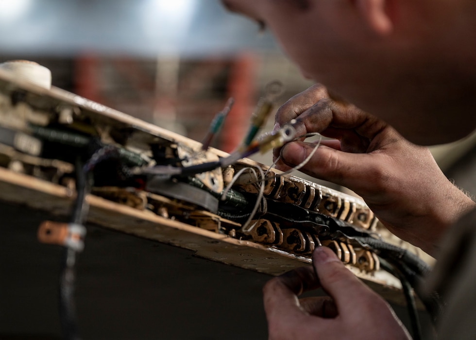 U.S. Air Force Staff Sgt. Logan Cindrich, 36th Fighter Generation Squadron weapons load crew chief, replaces an aircraft harness on an F-16 Fighting Falcon during RED FLAG-Alaska 26-1 at Eielson Air Force Base, Alaska, April 29, 2026. In addition to aircrew, RF-A provides training for deployed maintenance and support personnel in sustainment of large-force deployed air operations. (U.S. Air Force photo by Tech. Sgt. Mikaley Kline)