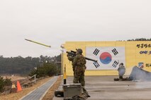 U.S. Marine Corps Lance Cpl. Antonio Alcantar, a low altitude air defense gunner with 12th Littoral Anti-Air Battalion, 12th Marine Littoral Regiment, 3rd Marine Division, employs the FIM-92 Stinger during Korean Marine Exchange Program 26.1 at Daecheon Firing Range, Republic of Korea, March 18, 2026.
