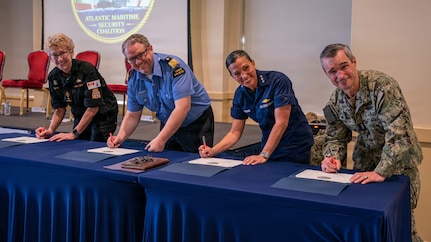 Vice Adm. Doug Perry, commander, U.S. 2nd Fleet, alongside U.S. Coast Guard, Royal Canadian Navy, and Royal Canadian Coast Guard leaders sign a maritime security agreement during the Atlantic Maritime Security Coalition (AMSC) final planning conference at Vista Point on Naval Station Norfolk, April 28, 2026.