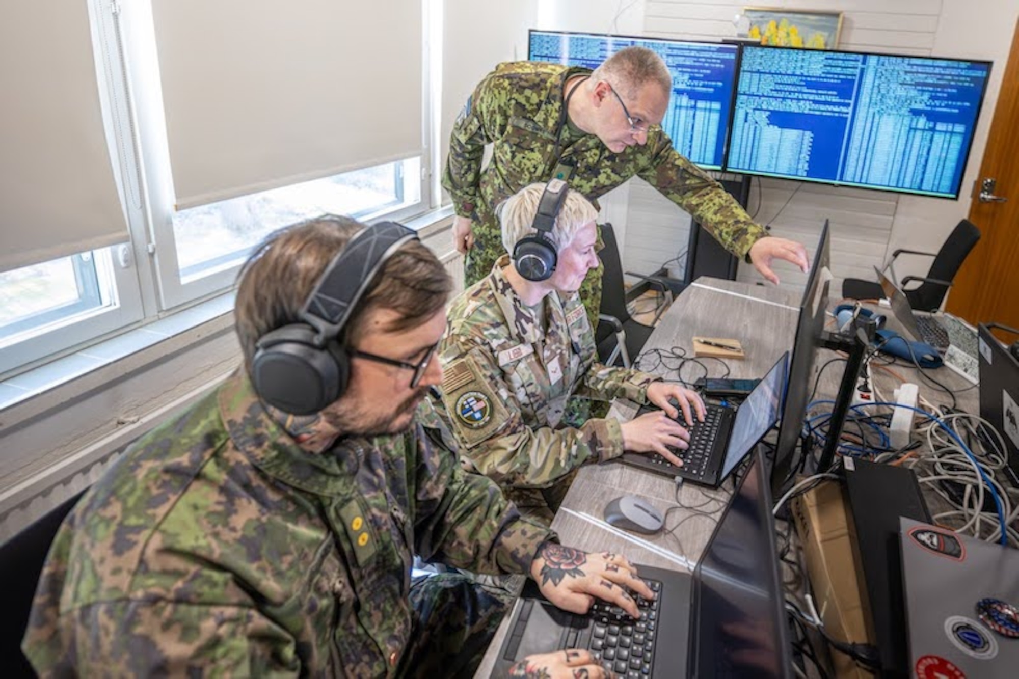 Maryland Air National Guard Airman 1st Class Bethany Libby, an exploitation analyst assigned to the 175th Cyberspace Operations Squadron, conducts defensive cyber operations with counterparts from Estonia and Finland during NATO Exercise Locked Shields 26 in central Finland, April 20, 2026.
