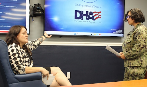 U.S. Navy Hospitalman Gabriela Piety, right, conducts a clinical assessment during a Primary Care Behavioral Health (PCBH) role-playing scenario. Madeline "Maddy" Todd, left, a Behavioral Health Consultant (BHC), simulated a spouse of a deployed active-duty service member experiencing distress to evaluate Piety's ability to screen for symptom severity, assess functioning, and determine the appropriate level of care. The exercise was conducted as part of Navy Medicine Readiness and Training Command (NMRTC) Patuxent River’s "Warrior Wednesday" initiative, which integrates mental health readiness and primary care behavioral health protocols into routine training evolutions.