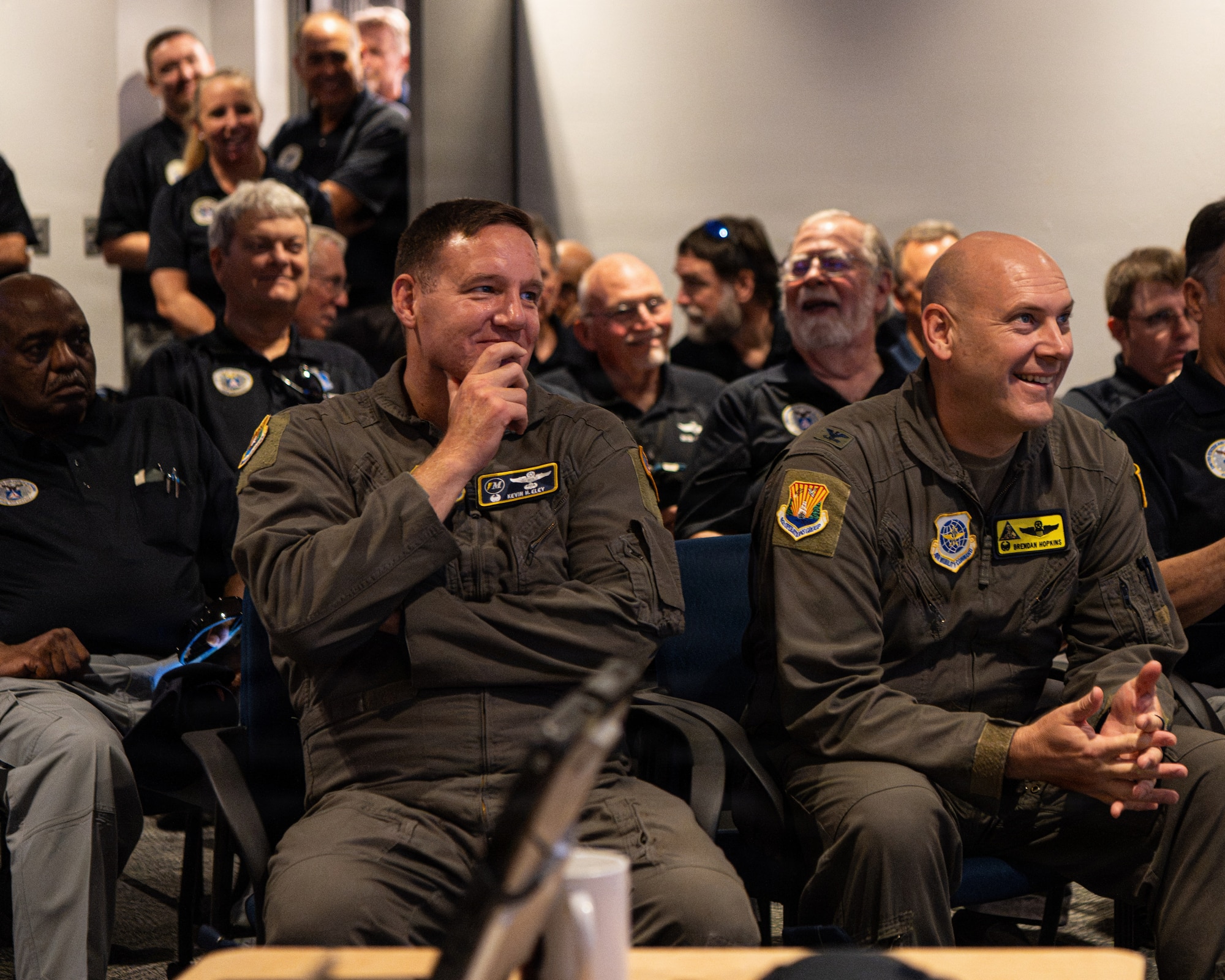 U.S. Air Force Col. Kevin Eley, 6th Air Refueling Wing commander (left), and U.S. Air Force Col. Brendan P. Hopkins, 6th Operations Group commander, attend a briefing for Operation Steadfast Eagle at MacDill Air Force Base, Florida, July 25, 2026. The 6th ARW and Civil Air Patrol aligned their operational schedules and reviewed final safety protocols to enhance coordination and communication during Operation Steadfast Eagle. (U.S. Air Force Photo by Airman 1st Class Helen Ly)