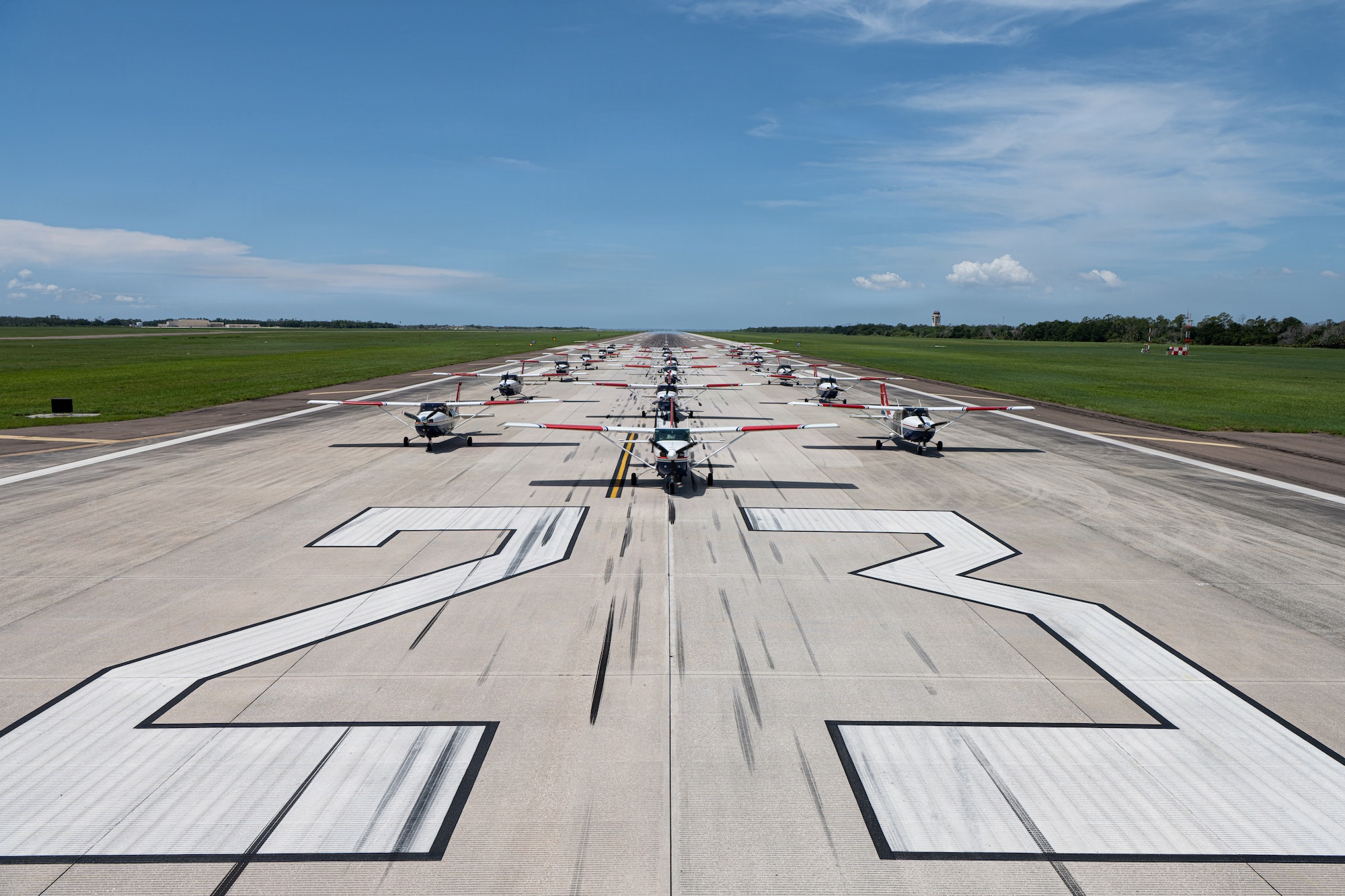 The Florida Wing Civil Air Patrol assembles over 20 CAP Cessna aircraft  at MacDill Air Force Base, Florida during Operation Steadfast Eagle, July 25, 2026. The exercise tested multiple CAP priorities, including the rapid mobilization of aircraft, the standardization of aircrew procedures and enhancement of pilot proficiency in a joint environment. (U.S. Air Force Photo by Airman 1st Class Helen Ly)