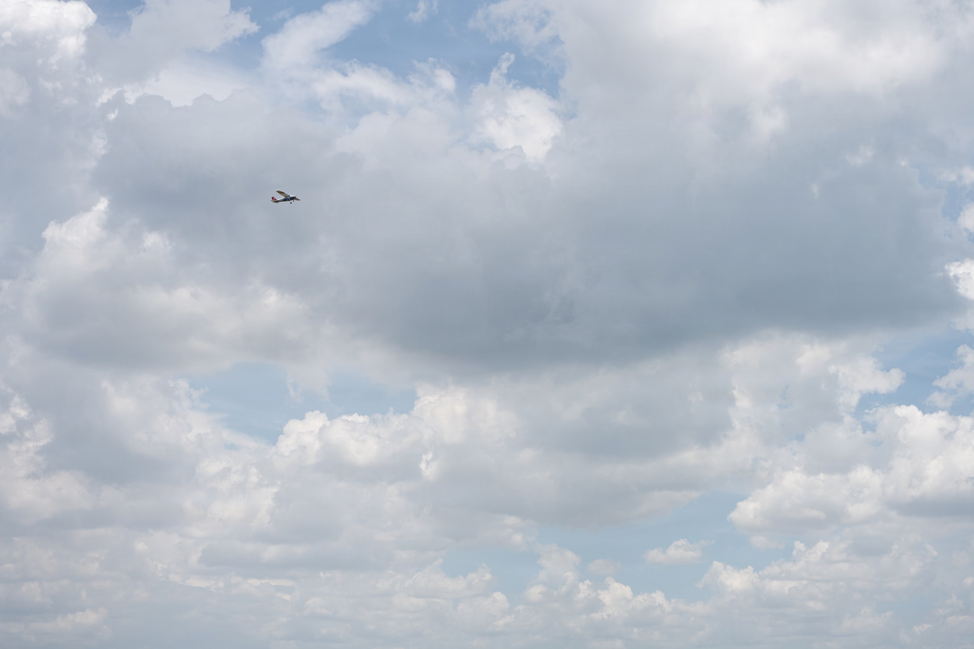 A Florida Wing Civil Air Patrol Cessna aircraft flies over MacDill Air Force Base, Florida, July 25, 2026. The CAP partnered with the 6th Air Refueling Wing to demonstrate the CAP’s ability to generate and deploy aircraft and crews in support of U.S. Air Force Operations. (U.S. Air Force Photo by Airman 1st Class Helen Ly)