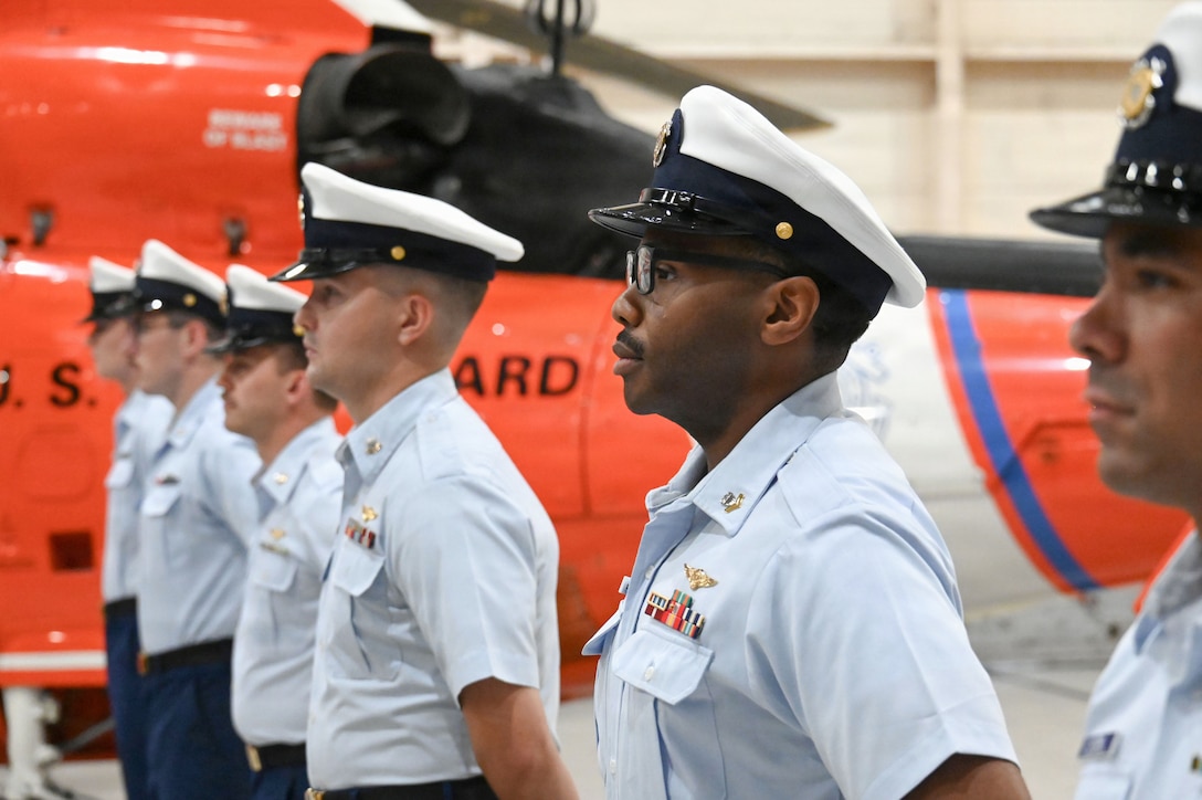 Coast Guard Air Station Savannah crew members stand in formation during a change-of-command ceremony in Savannah, Georgia, July 31, 2026. The change-of-command ceremony marks a transfer of total responsibility and authority from one individual to another. (U.S. Coast Guard photo by Petty Officer 1st Class Brandon Hillard)